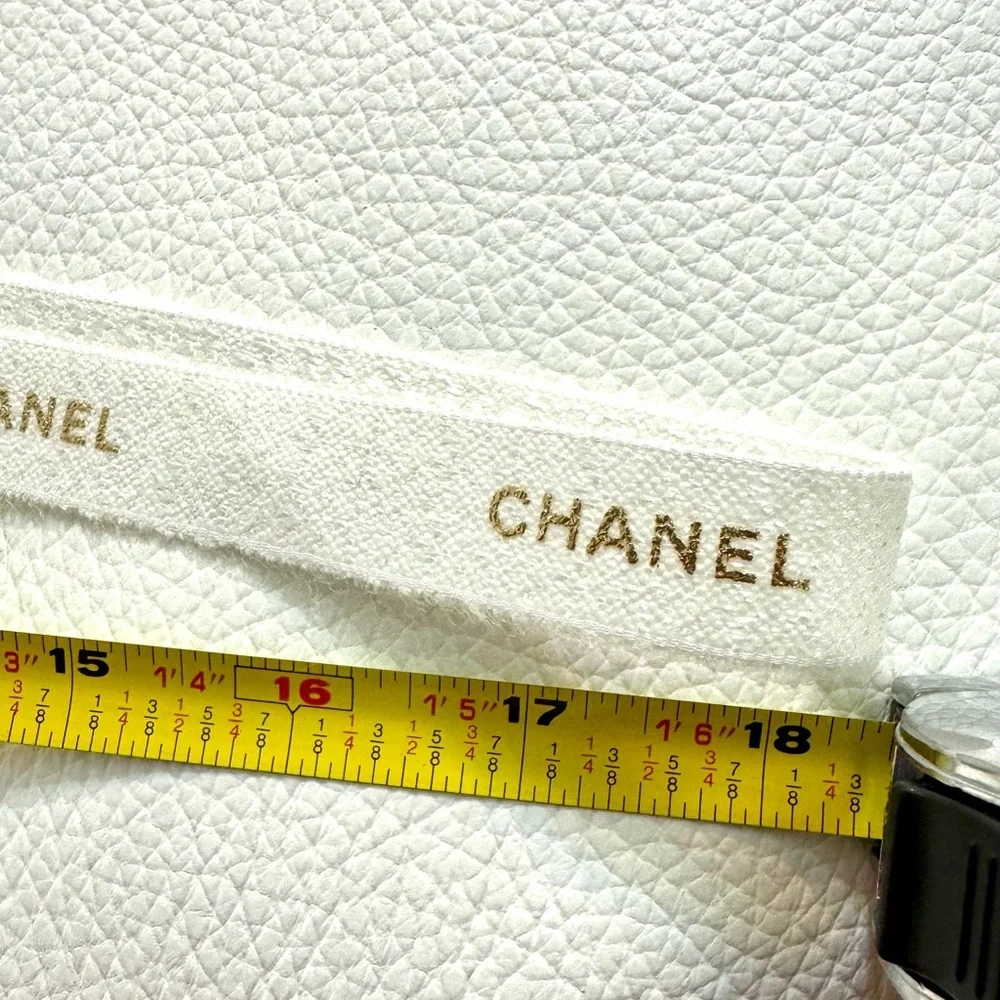 Chanel White Ribbon w gold font limited edition for holiday